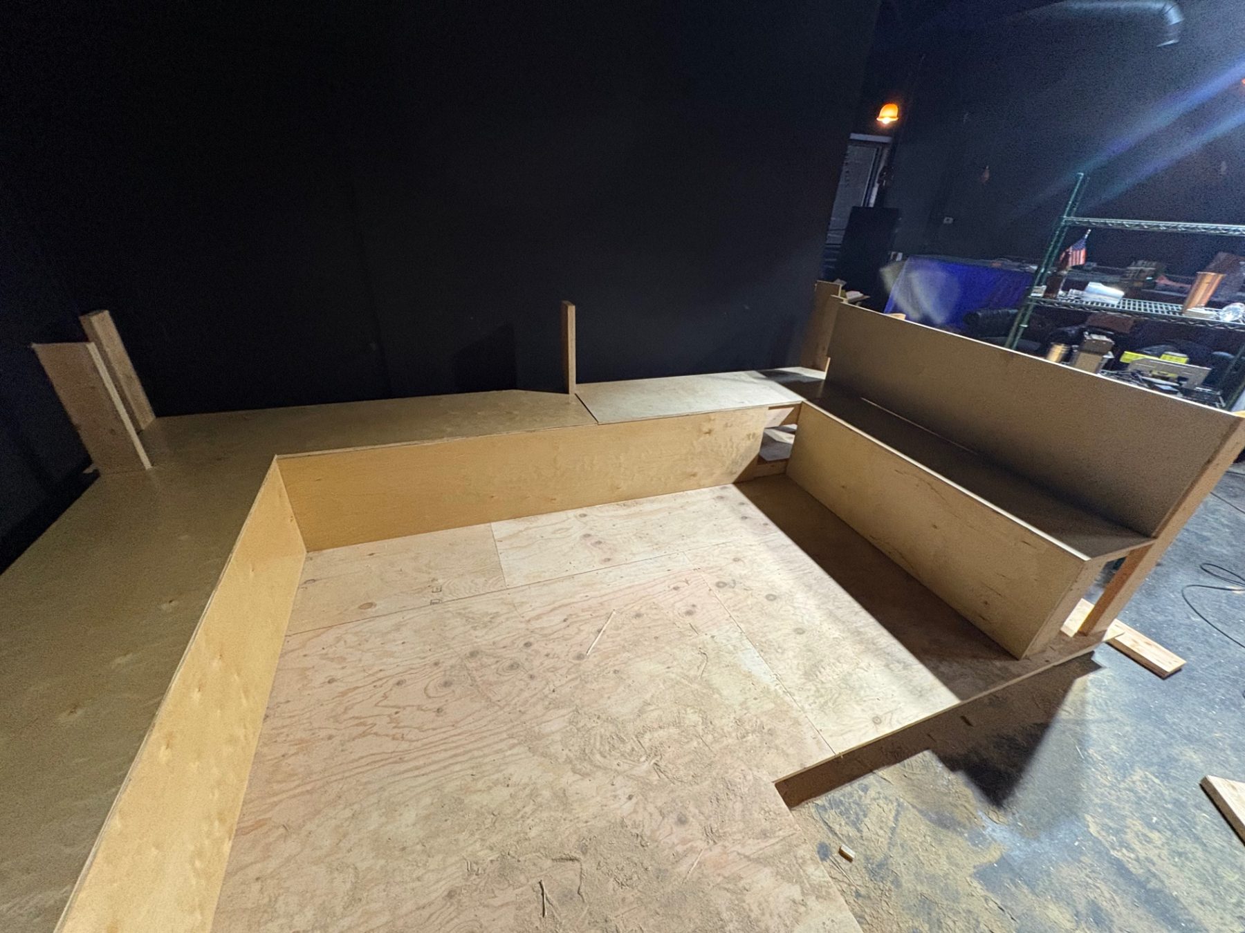 Custom tiered seating construction in commercial interior