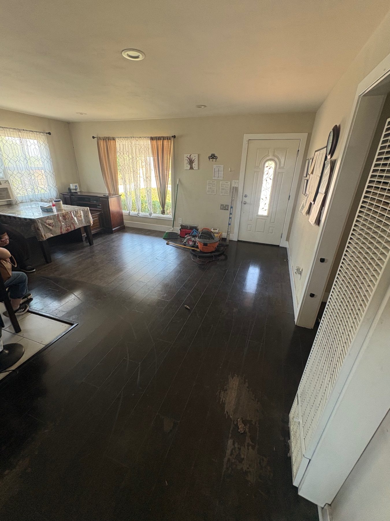 Existing residential dark flooring before removal