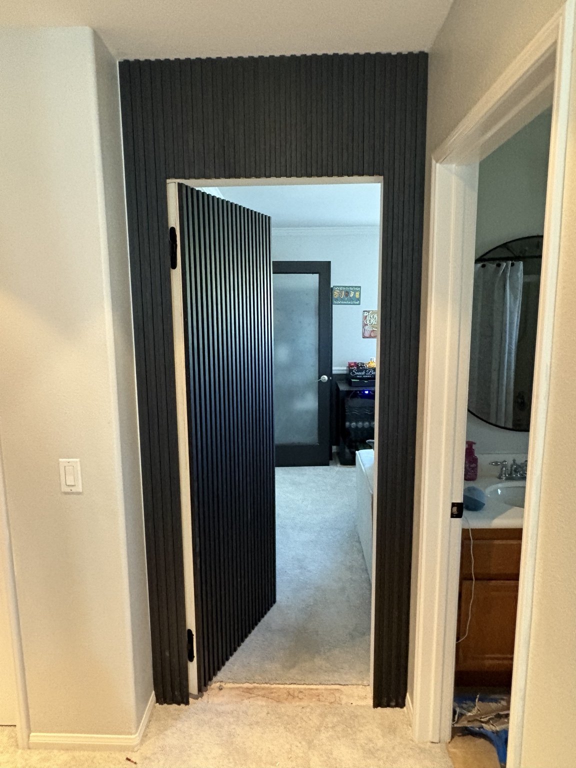 Hidden Door Slat Accent Wall