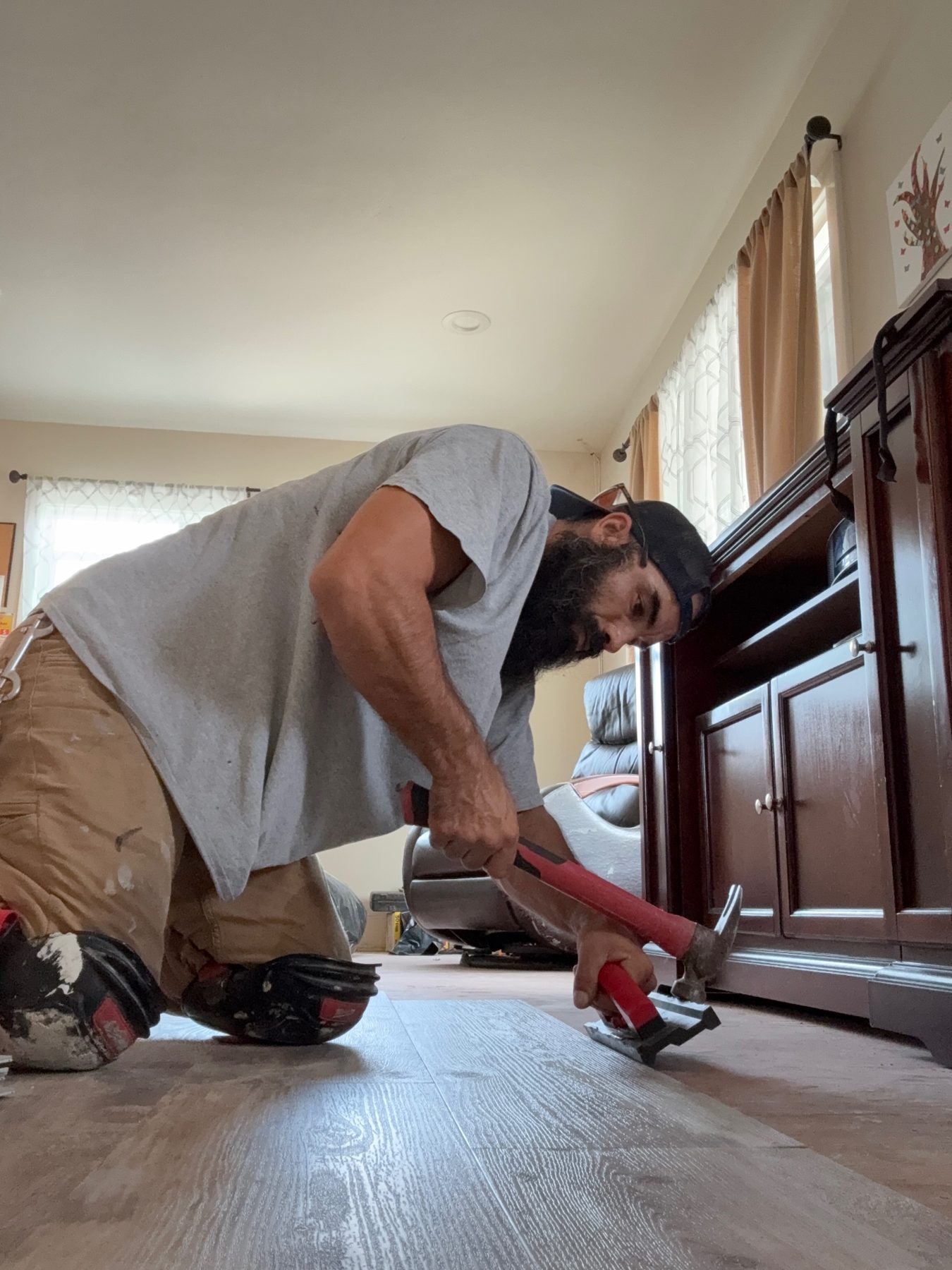 Barrows Builds installing luxury vinyl plank flooring