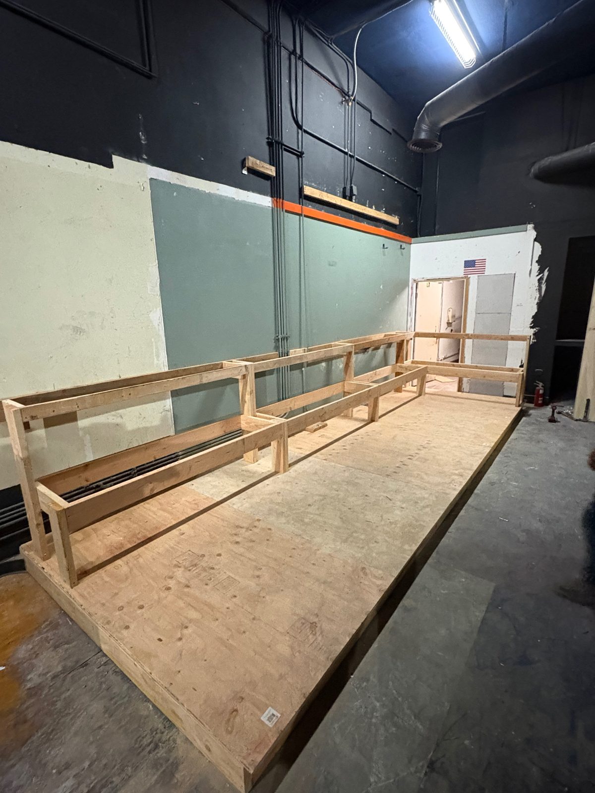Framing of the custom tiered seating on the platform